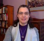 Photo: Rabbi Pizarro with book in background.